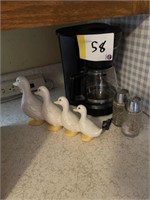 Ducks, coffee pot
