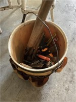 Bucket full of landscaping tools
