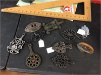 Collection of trivets and Sad irons
