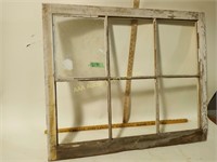 Wood framed window, panels missing glass