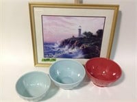 Mixing bowls and framed picture of lighthouse