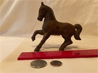 Vintage cast iron horse bank, contents included
