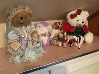 Stuffed animals and a plastic horse