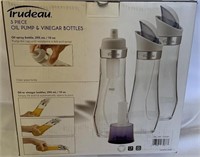 Trudeau 3pc oil pump & vinegar bottles (one cap b)