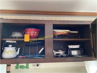 Cabinet Contents Above Stove - cutting boards