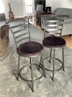 Pair of metal barstools with padded seats