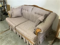 Cloth loveseat with wood accent