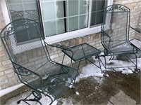 2 outdoor metal rocking chairs and table