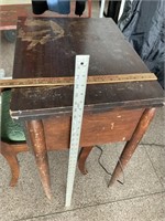 antique Singer sewing machine with chair