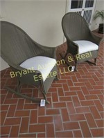 2 BROWN OUTDOOR ROCKING CHAIRS (WICKER CHAIR)