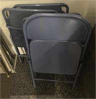 Lot of 4 blue folding chairs