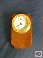 Mariner's style Bulova alarm clock gold color with