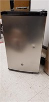 New GE 4.4cu ft compact refrigerator small dent