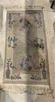 Small oriental design carpet rug with some