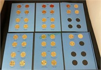 Coins - complete set presidential golden dollars,