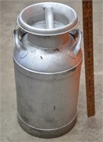 Primitive metal milk can