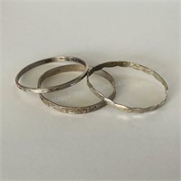 Three Silver Bangle Bracelets