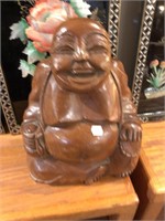 Wood happy Buddha