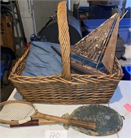 BASKET, BOAT AND VINTAGE TENNIS RACKETS