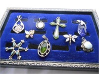 (9) ALL MARKED STERLING SILVER PENDANTS.