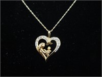 10K GOLD CHAIN W/ MOTHER AND CHILD HEART PENDANT