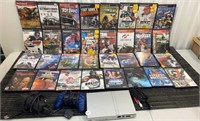 Sony PlayStation 2 with controller and 32 games.