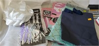 Misc lot...gift bags, table cover, bow..etc