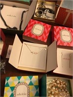 Lot of mainly boxed jewelry- Cross in the middle g