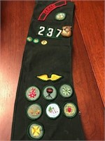 Girl Scout sash with patches