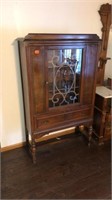 Antique wooden curio cabinet