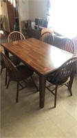 Wood dining room table & 6 wooden chairs
