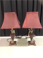 Pair of burgundy lamps