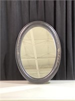 Wood framed oval mirror