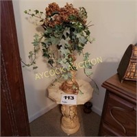 Decorative small table with flower arrangement