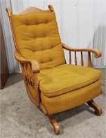 Rocking chair, mustard colored upholstery,