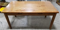 Large wooden kitchen table, has some wear,