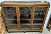 Leaded Glass Cabinet measures 60" x 13" x 54"