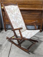 Floral upholstered rocking chair, seat is at 15",