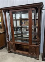 Curved curio/china cabinet, mirrored backing,