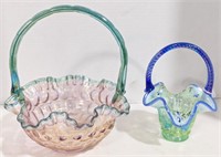 Two Fenton marked glass baskets. Larger basket