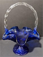 One cobalt glass basket with a flower pattern