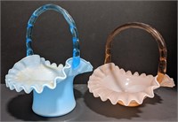 Two Fenton-style glass baskets. Blue ruffle edge