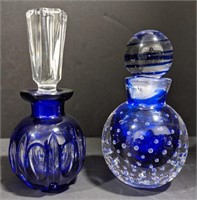 Two cobalt color glass perfume bottles with