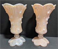 Two matching light pink iridescent vases marked