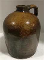 Primitive handled brown jug
