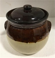 Stoneware cookie jar measures approximately 8”