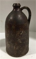 Handled stoneware jug measures approximately 10”