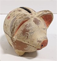Vintage painted clay piggy bank. Measures 5