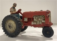 Vintage plastic auburn farmer on tractor