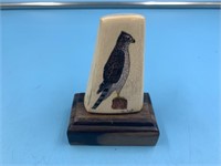 Painted fossilized mammoth Ivory portion of a bird